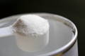 a full scoop of white collagen powder