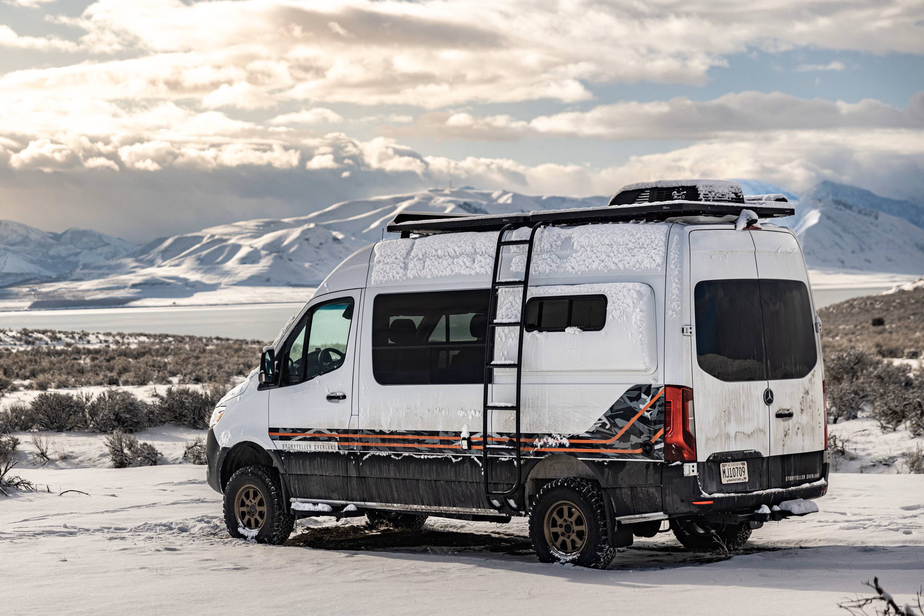 Talon Sei compared Storyteller Overland vs. Winnebago Revel after making the switch to a Storyteller Overland Classic MODE adventure van. His new van, shown above, is a Classic MODE with stripes on the exterior that he customized with Lucid Wraps in Denver, Colorado.