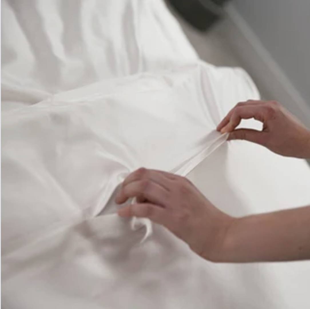 silk duvet cover rolled into a spiral