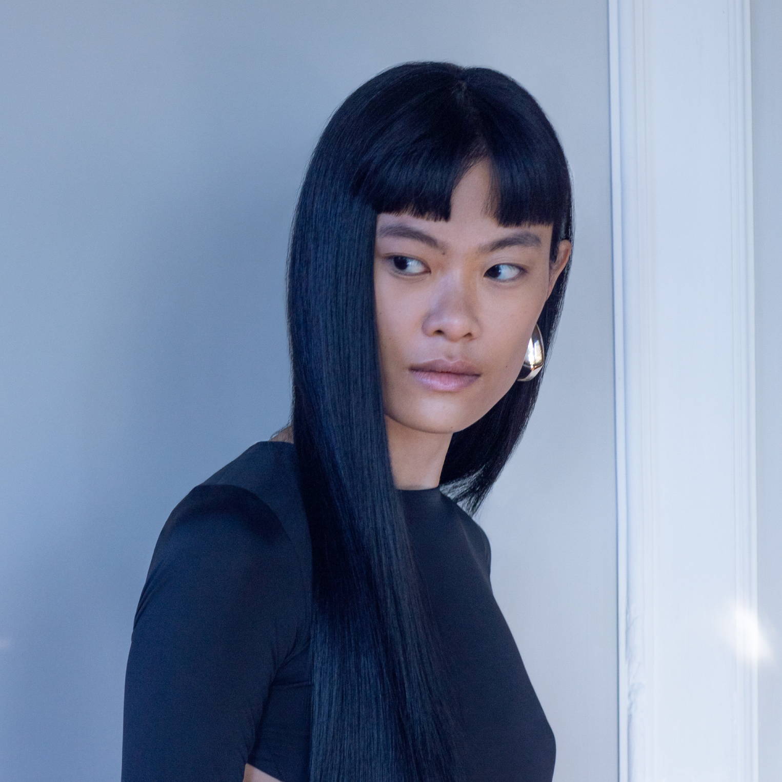 Davines There Must Be An Angel model with long, sleek hair