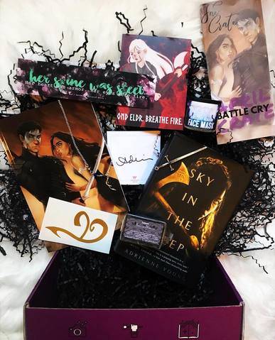 April 2018 Battle Cry box theme included Sky in The Deep by Adrienne Young, Fae Crate Exclusive Strength Rune Decal, Grisha Amplifier Necklace, Breccia Domain Soap, Fae Crate Exclusive Silver Face Mask Powder, Fae Crate Exclusive Tiny Sword, Double-sided bookmark, Journal, War Storm T-Shirt, and E-Book Download of Glamour of Midnight by Casey Bond. 