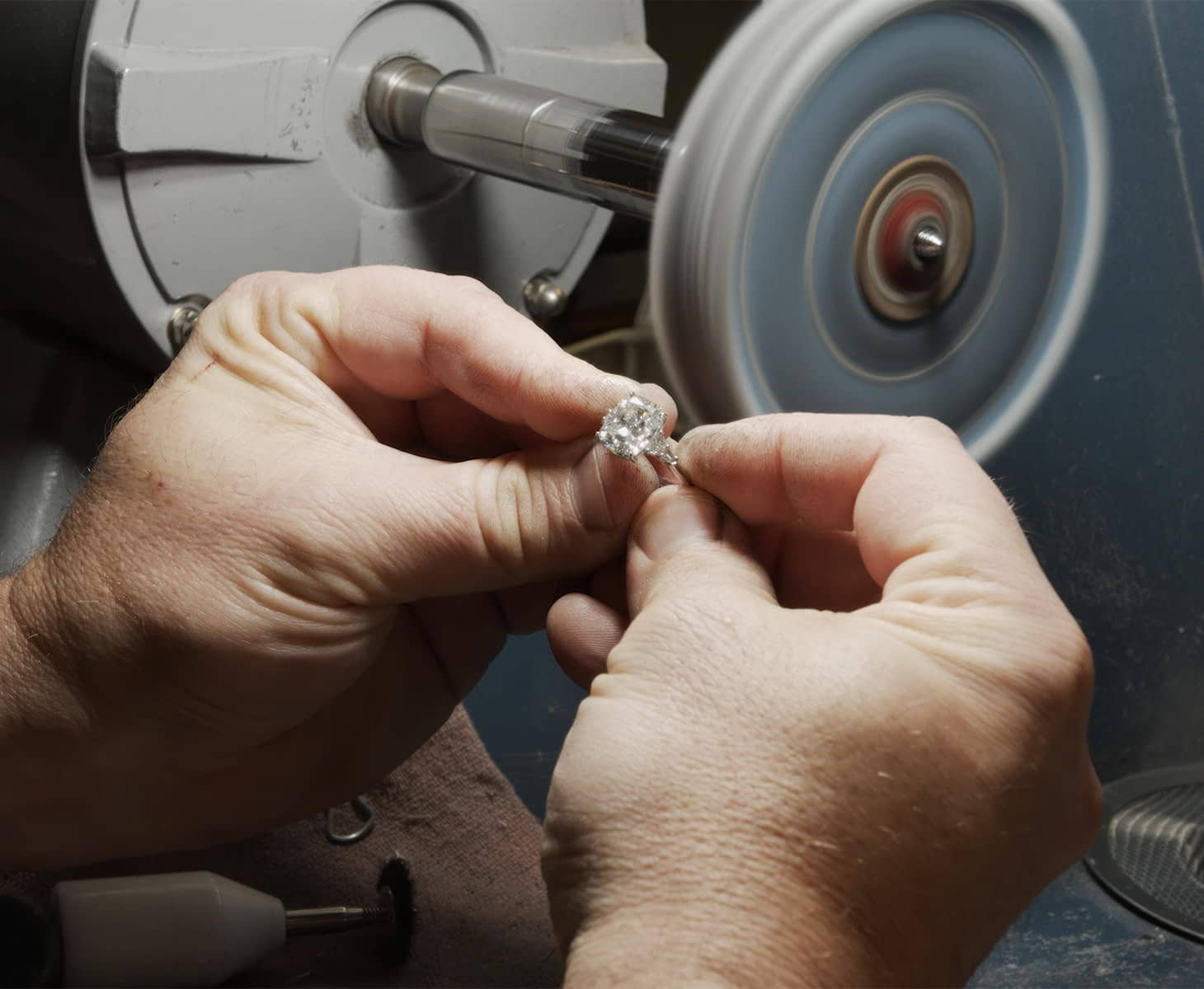 New custom engagement ring being polished.
