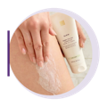 slow body polish being applied to a thigh