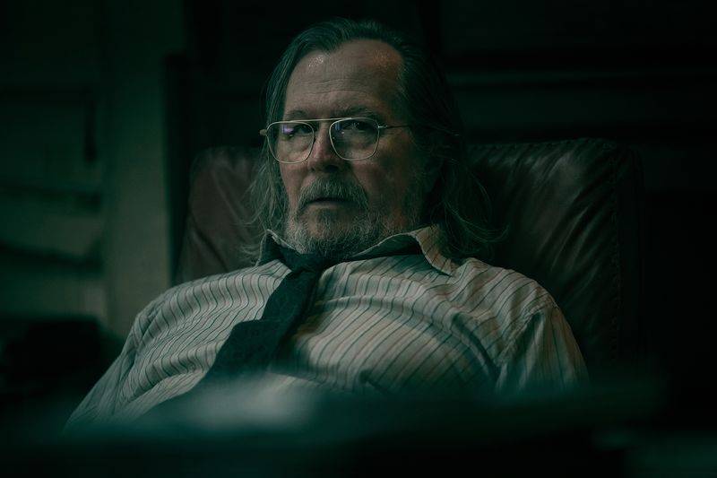 Image may contain: Gary Oldman, Face, Head, Person, Photography, Portrait, Adult, and Beard