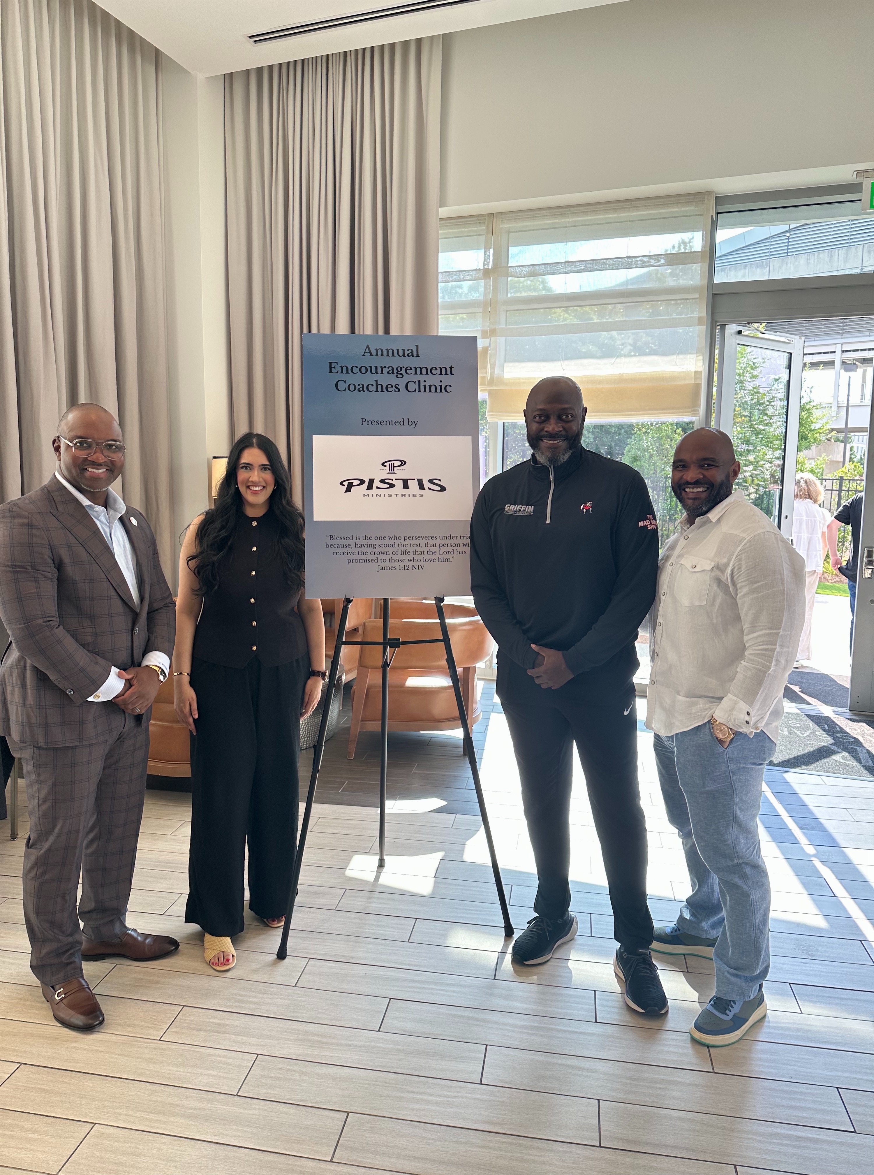 Encouragement Coaches Clinic event photo with clinic poster