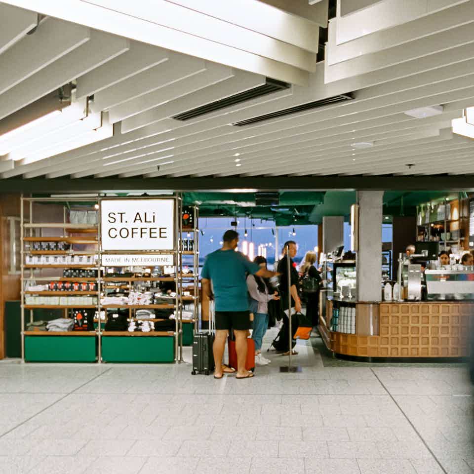 Cafe interior with aeroplane outside window at an airport