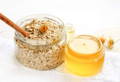 raw oats and honey as ingredients to use in a natural, home made face mask