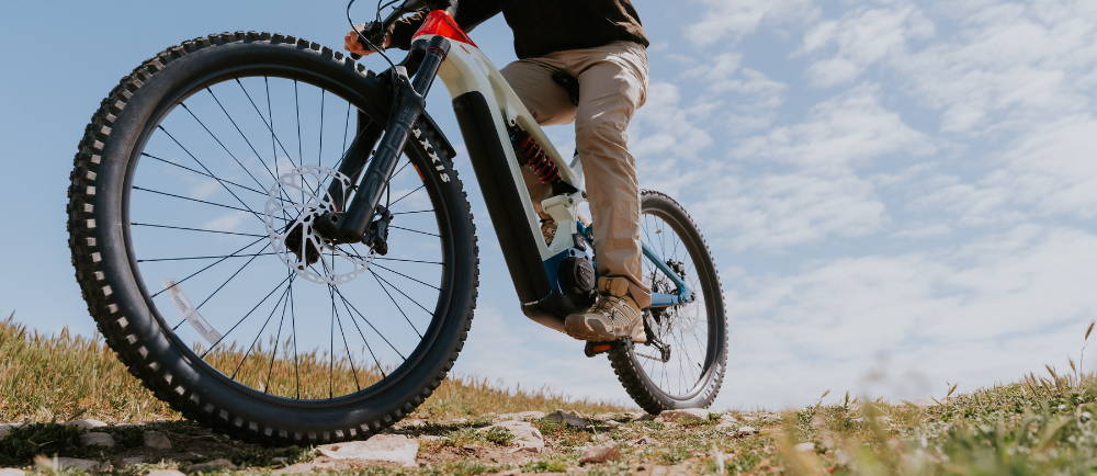 Rider with an electric mountain bike