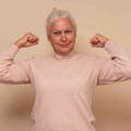 strong-senior-elder-female-flex-muscles