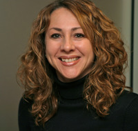 Denise Book-Hernandez, Lucas' assistant, was the other half of the defecting team.