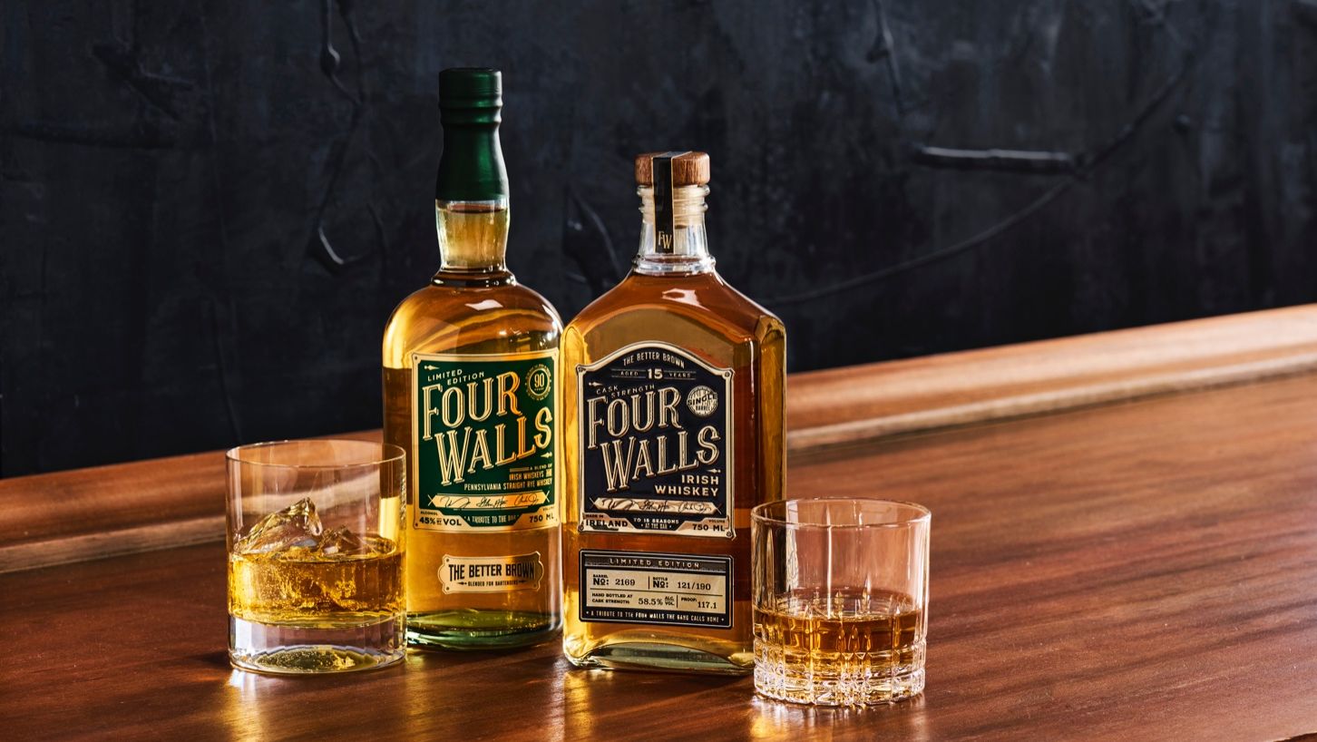 Four Walls Whiskey Will Transport You To A World Filled With Dark Tufted Leather