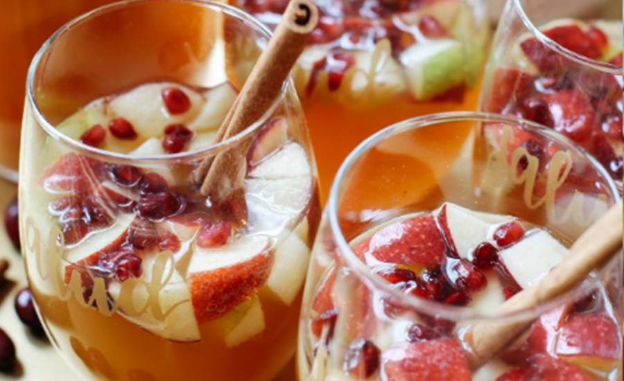 Sangria drinks with fruit inside glasses