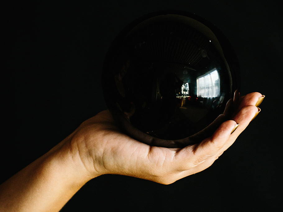 Large obsidian sphere that creates a black mirror for scrying