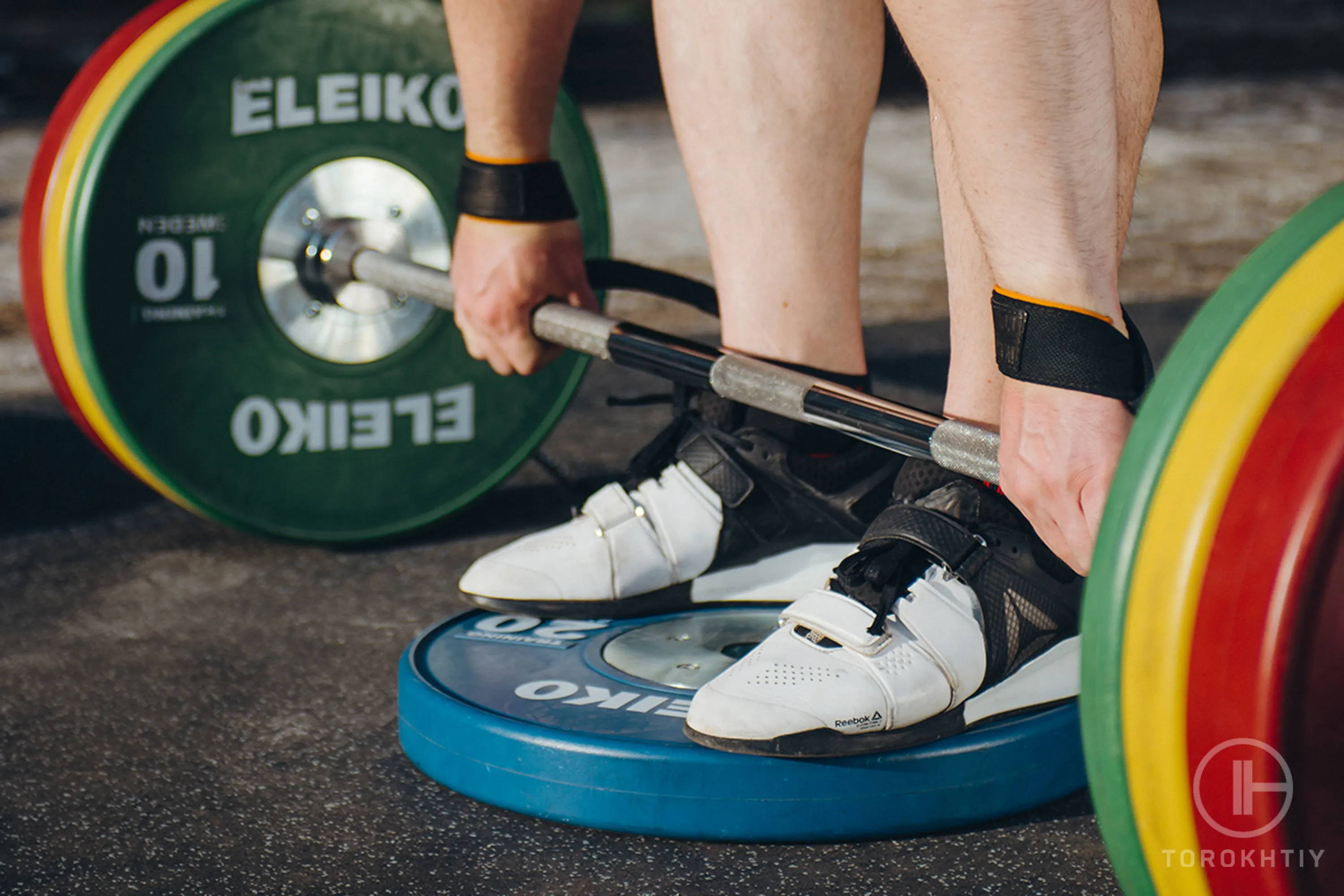 athlete is lifting in flat shoes