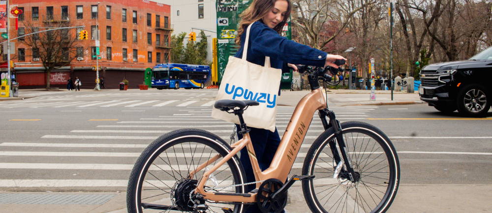 A woman on e-Bikes in China Town