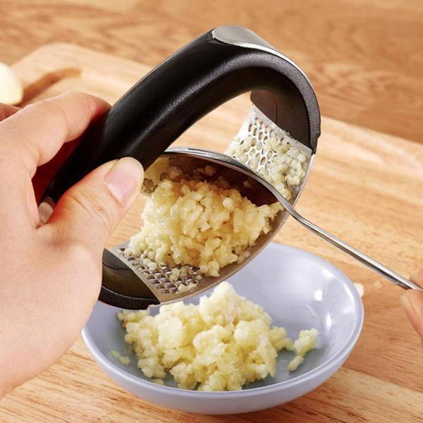 Professional garlic press in stainless steel