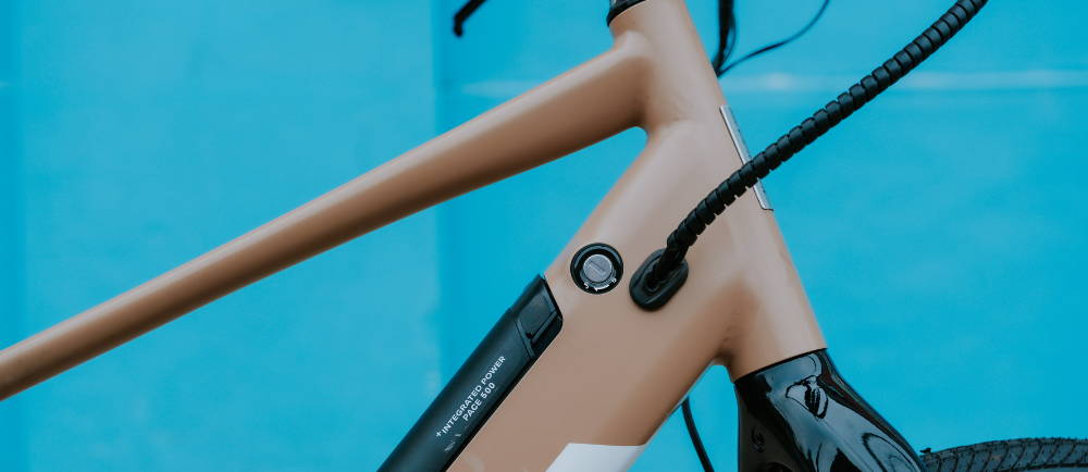 A tan Aventon Pace 500.2 electric city bike