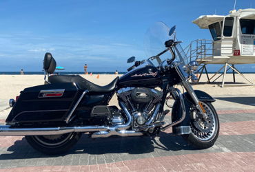 2011 HARLEY-DAVIDSON FLHRC ROAD KING CLASSIC (BLACK) motorcycle for rent near Fort Lauderdale, FL