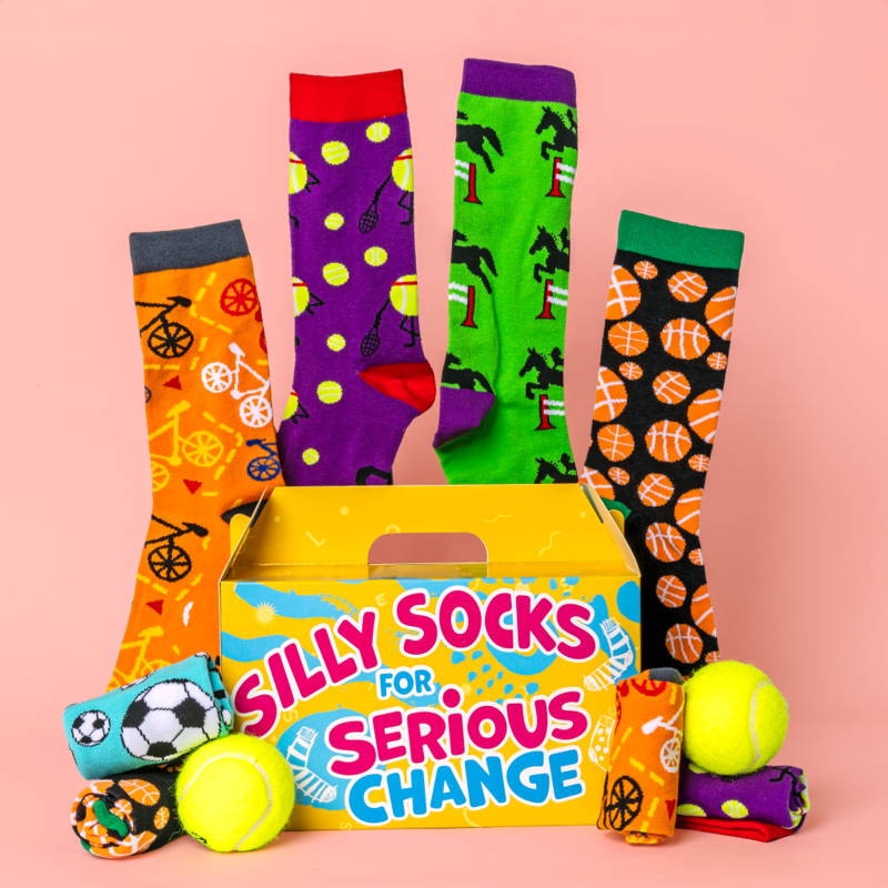 Activity Themed Jolly Soles Fundraiser Sock Box featuring socks with sports patterns like golf, soccer, roller-skates, dancing and billard balls.  