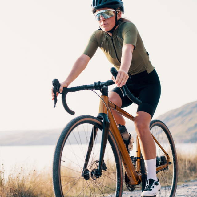 a woman on an electic road bike