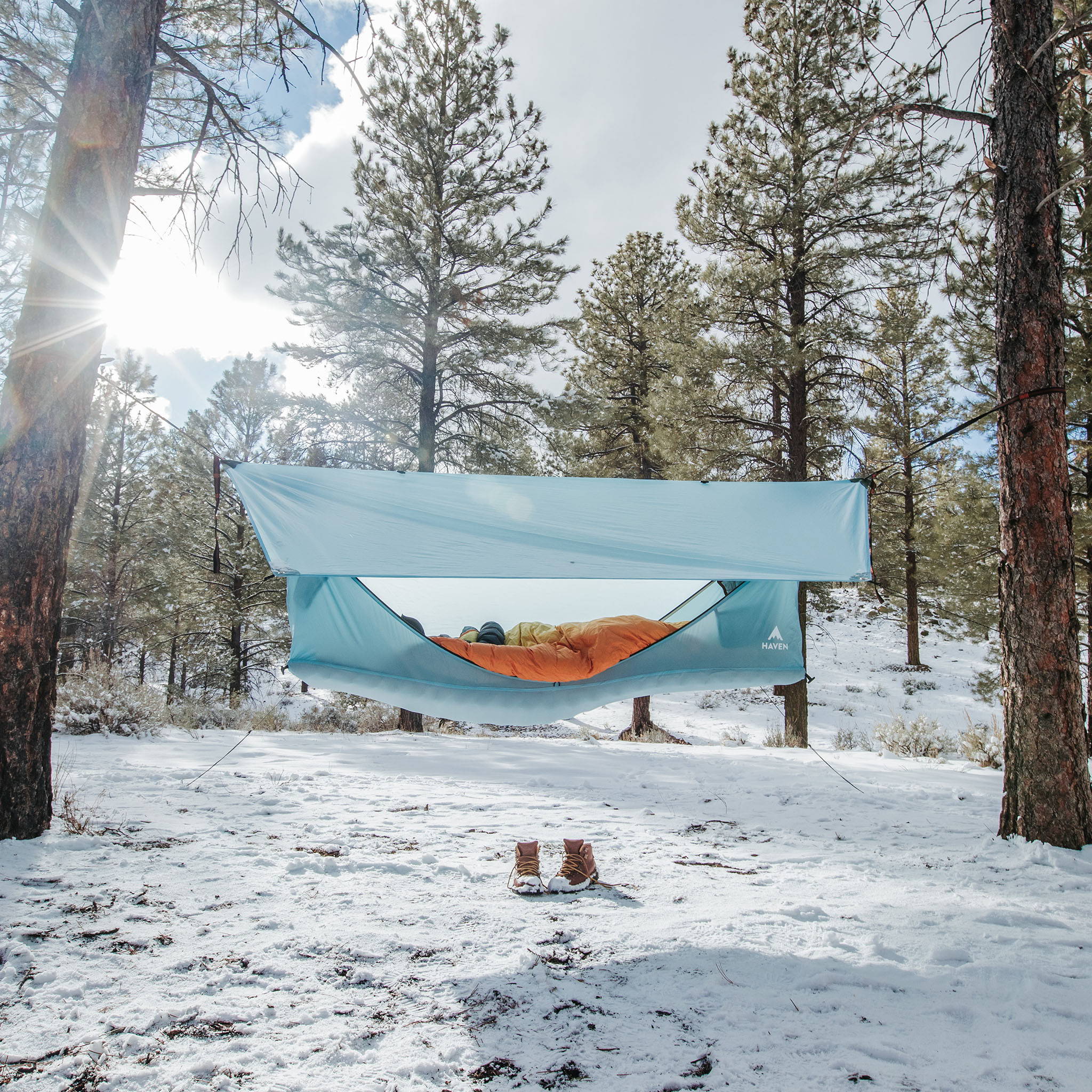 Lay flat hammock tent camping with snow