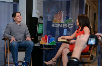 CNBC's Melissa Lee, conducts a post-panel debrief with Mark Cuban after his showdown with Christopher Cox.