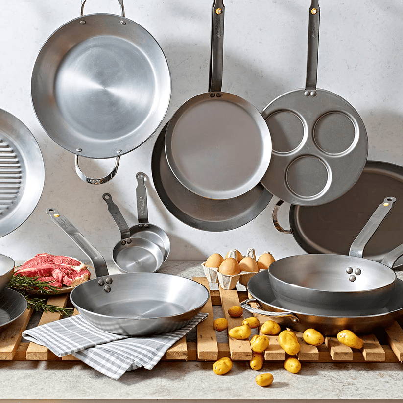 A de Buyer tortilla pan with an assortment of their other pans. Image from de Buyer USA website. 