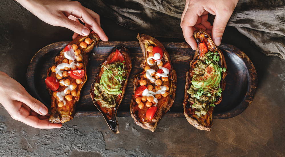 healthy chickpeas and tomatoes on sweet potatoes 