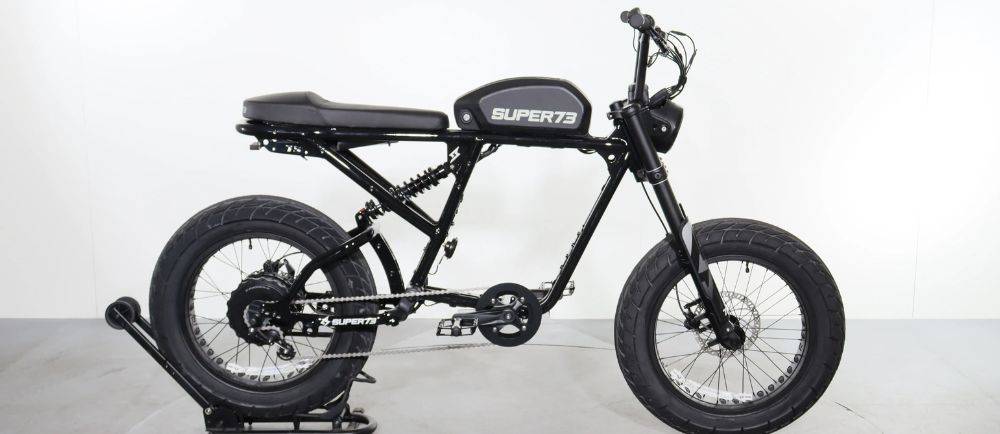 Super73 R Brooklyn e-bike on a stand