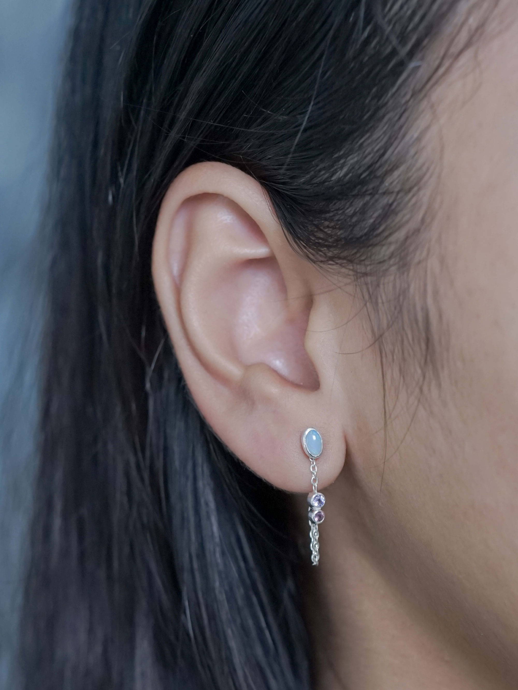 Earrings attached by chain clearance