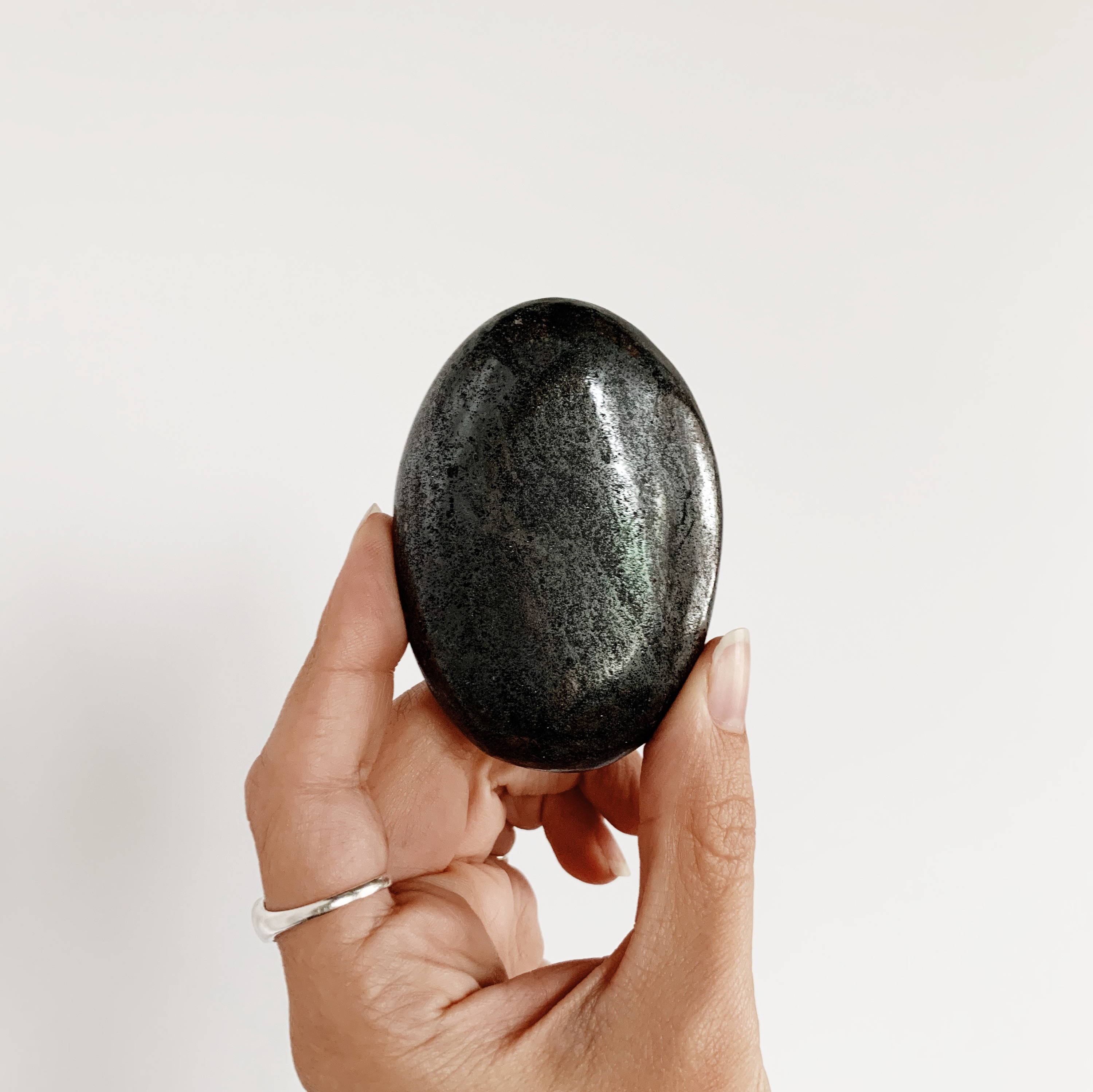 Hematite Palm Stone, one of the Root Chakra Stones