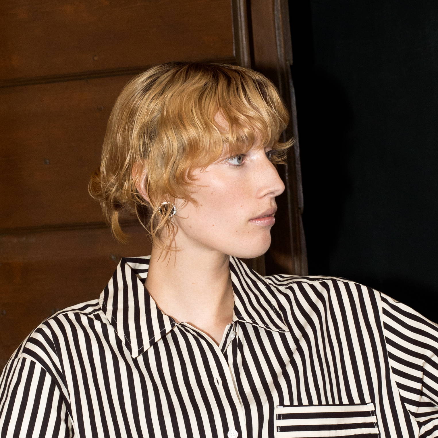 woman with blonde hair and bangs