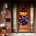 Montessori Halloween Pumpkin hanging on the front door. 