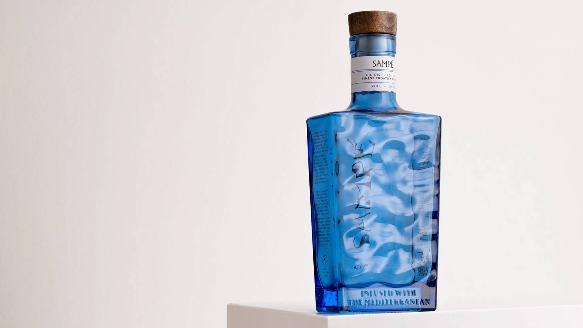 Featured image for SAMPÉ Gin's Bottle Takes Deep Inspiration From Mediterranean Aesthetics