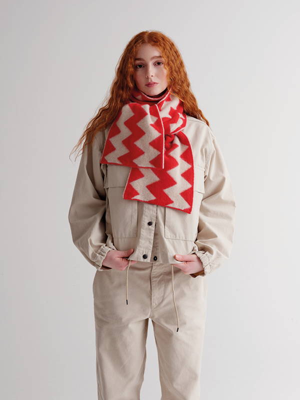 model wears    Brushed Zigzag Scarf Poppy & Oatmeal