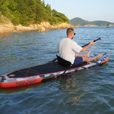 Boy paddleboard in British Columbia Lake with Funwater SUP paddle board
