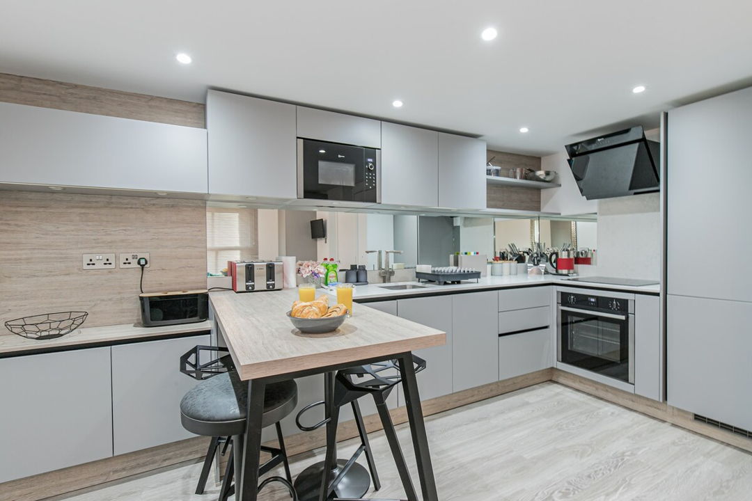 Breakfast bar next to kitchen perfect for the morning