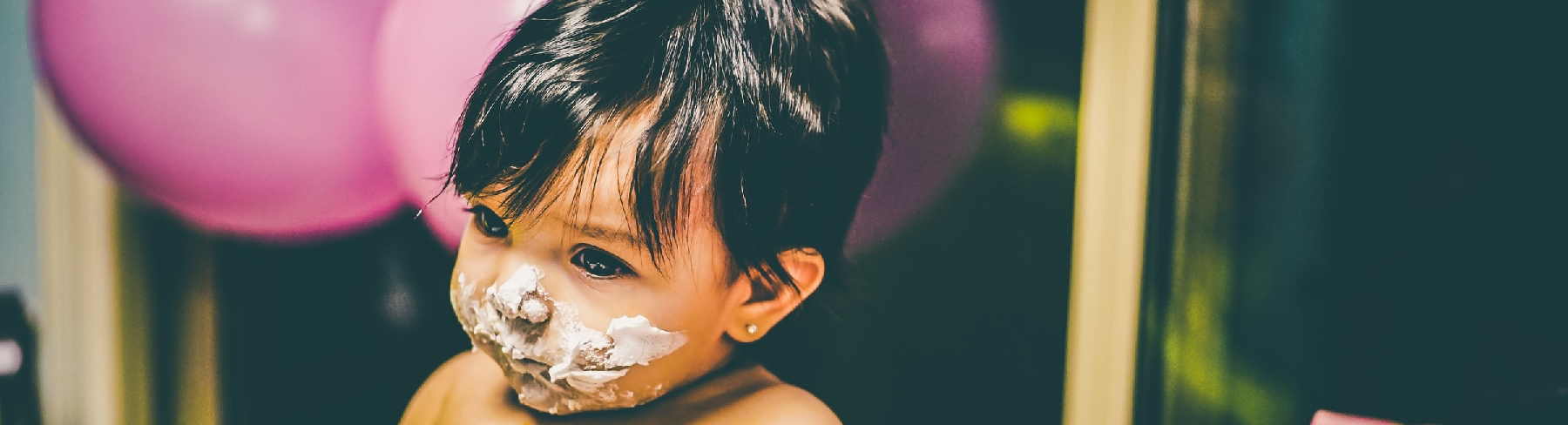 Child with ice cream on his face