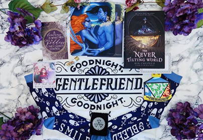 October 2019 Break the Wheel box theme included The Never Tilting World by Rin Chupeco, Reign the Earth Patch, Meira Chapstick, Bone Witch Socks, Strange the Dreamer Mouse Pad, Gentlefriend Pillowcase, Three Dark Crowns Collectors Coin, Strange the Dreamer Theme Art, E-Book Download of Significance by Shelly Crane, Darkest Minds Polaroid, and City of Brass Shirt for Seelie and Solitary Fae boxes only. 