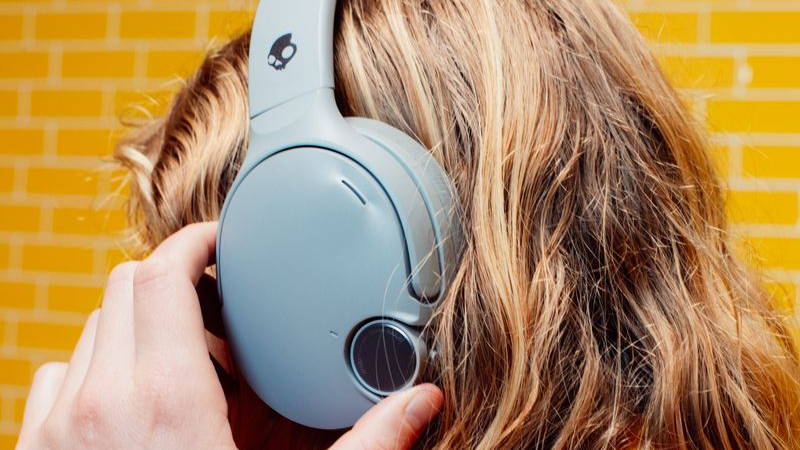 Image may contain: Electronics, Headphones, Brown Hair, Hair, Person, and Adult