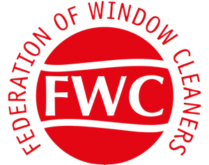 Red and white logo with the letters FWC in bold at the center. Surrounding the letters, the text reads Federation of Window Cleaners in a circular layout.