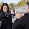 female-deploying-pepper-spray-at-attacker