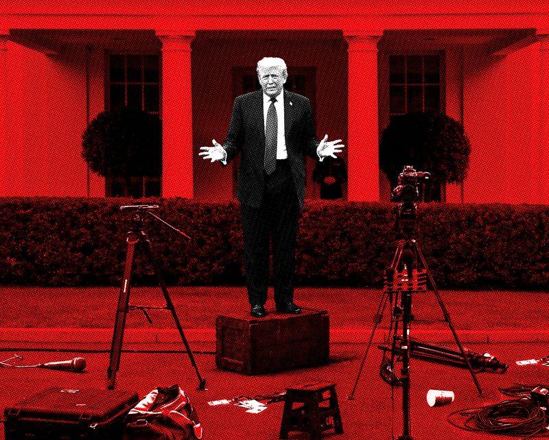 Image may contain: Donald Trump, Tripod, Photography, Adult, Person, Clothing, and Coat