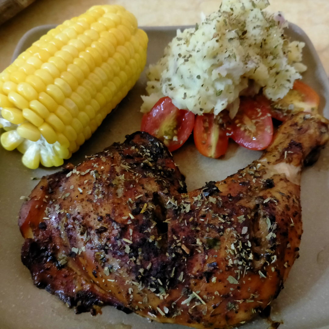 Roast chicken thigh with mashed potatoes and corn!