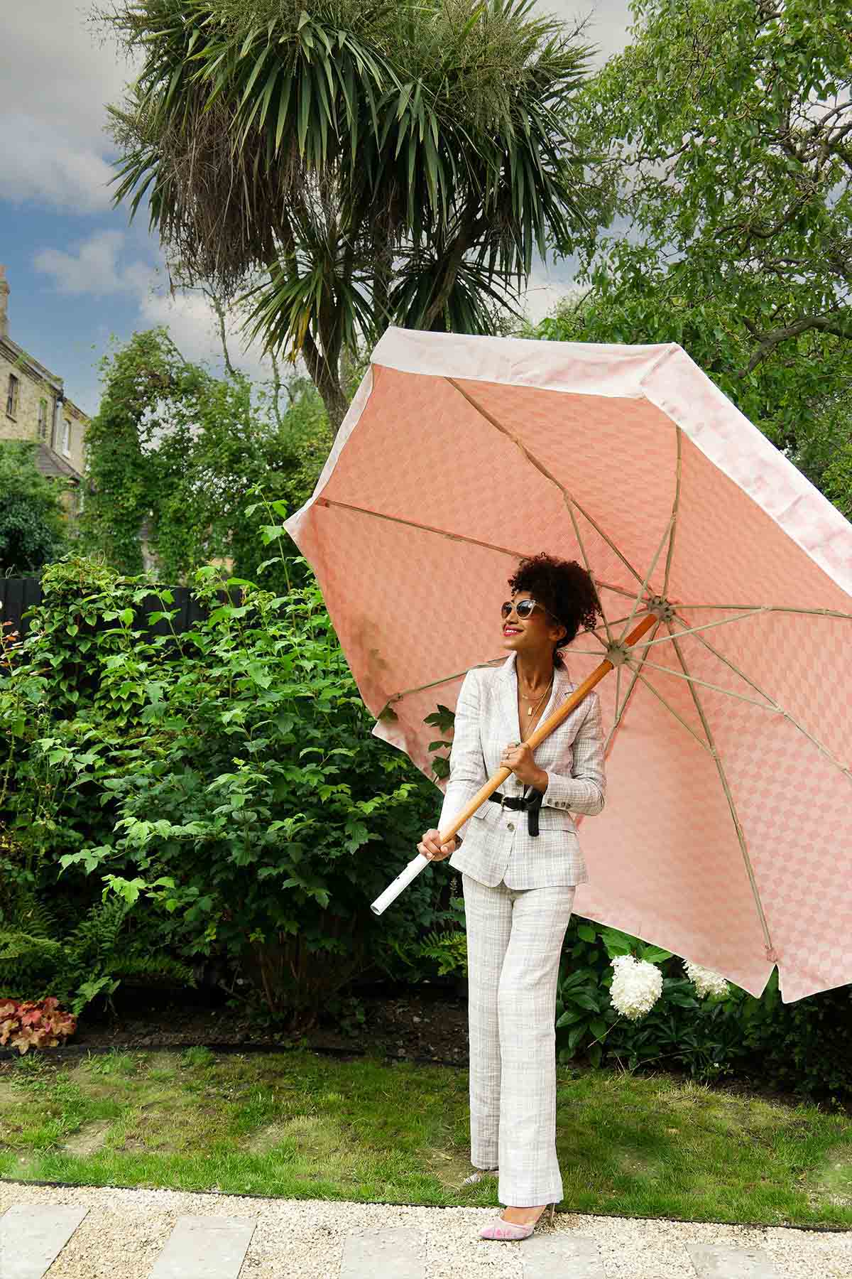 Hazel Gardiner wears Yolke's Lilac Check Linen Suit