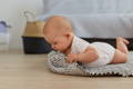 Little baby enjoying tummy time.