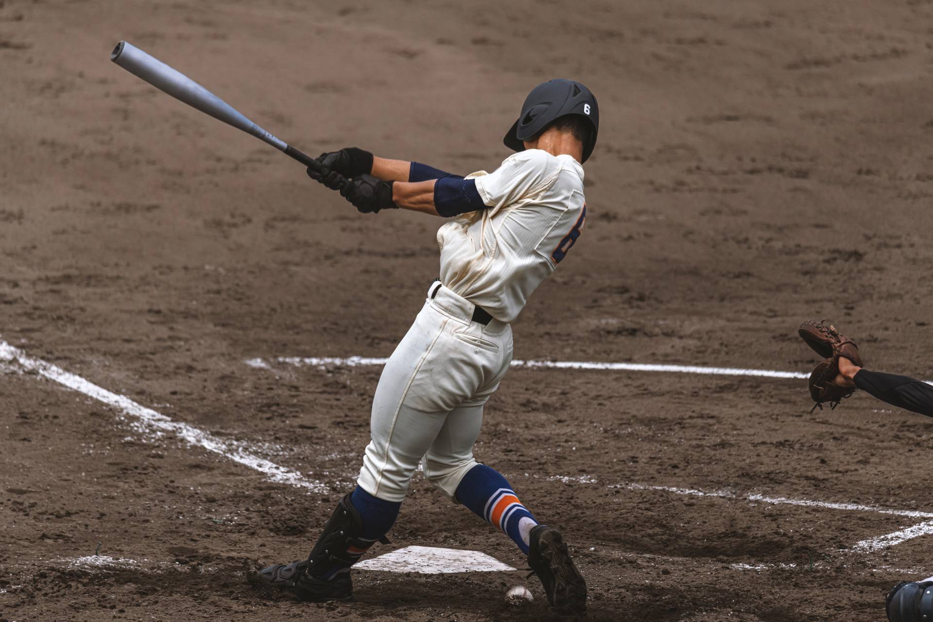 Baseball player performing hit the ball