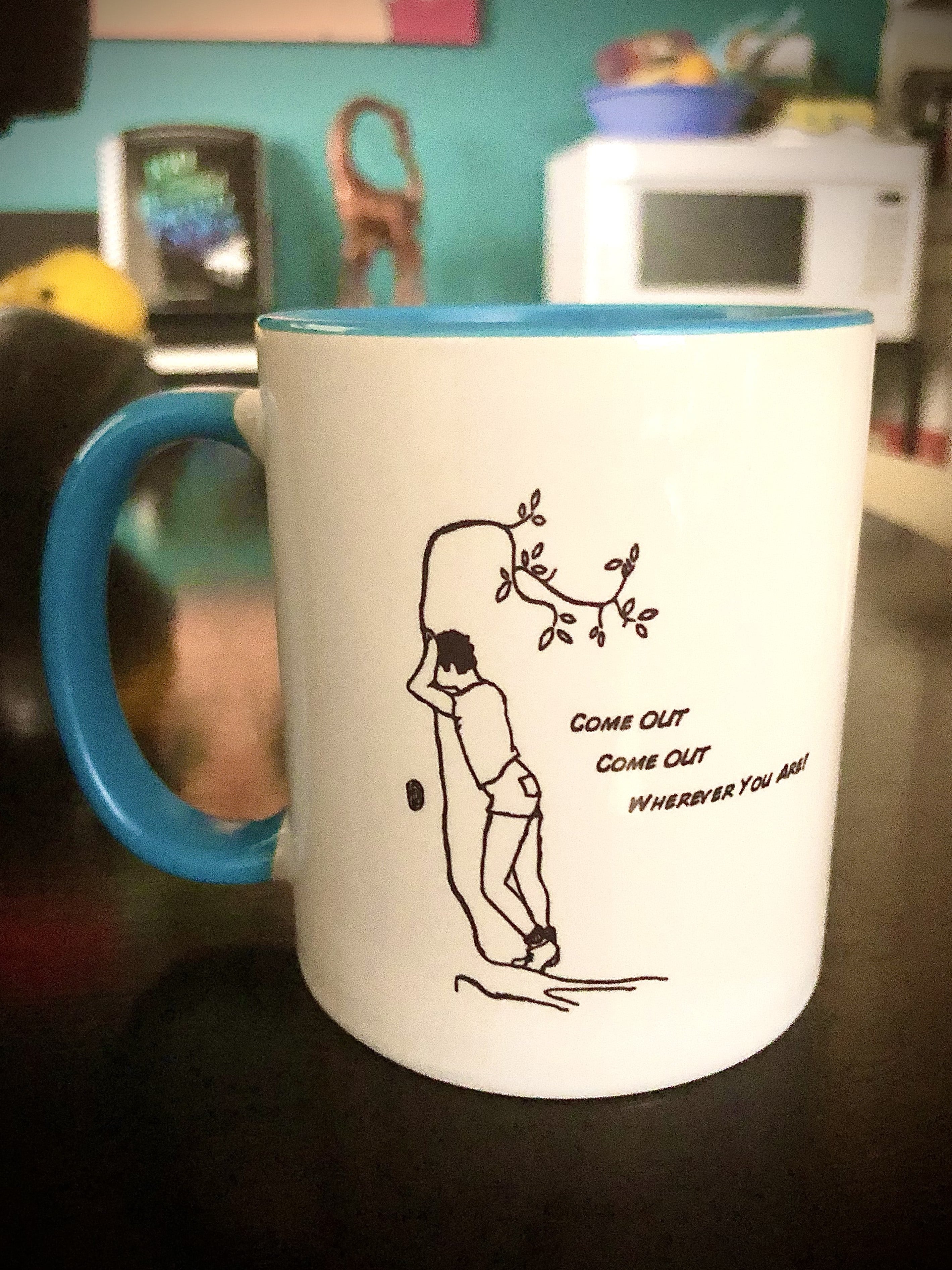 A mug with a man and the text 