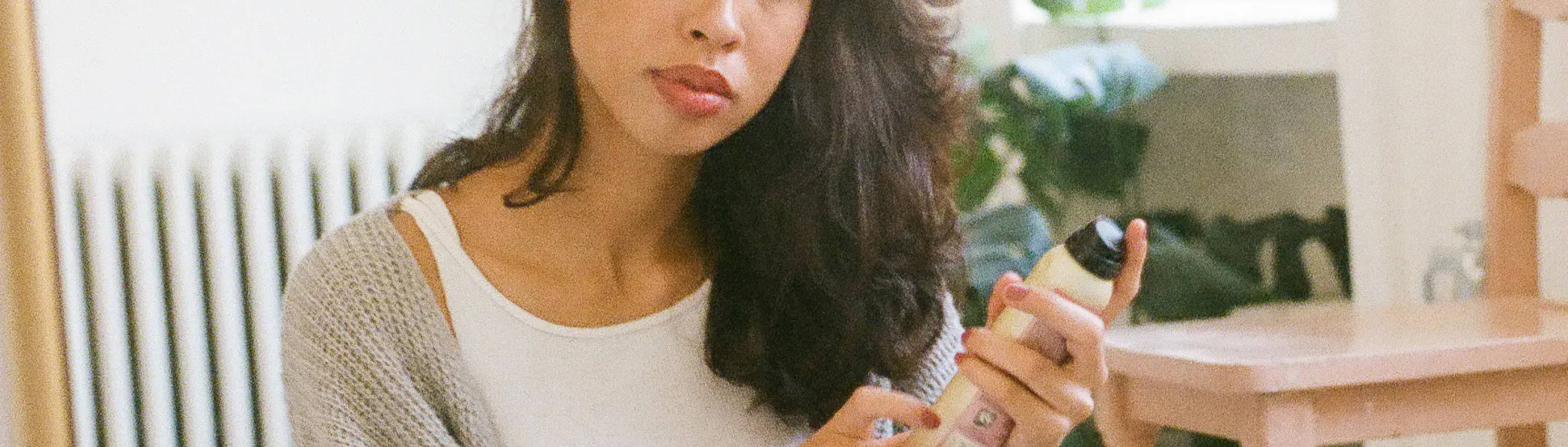 Woman with wolf cut using Davines hairspray