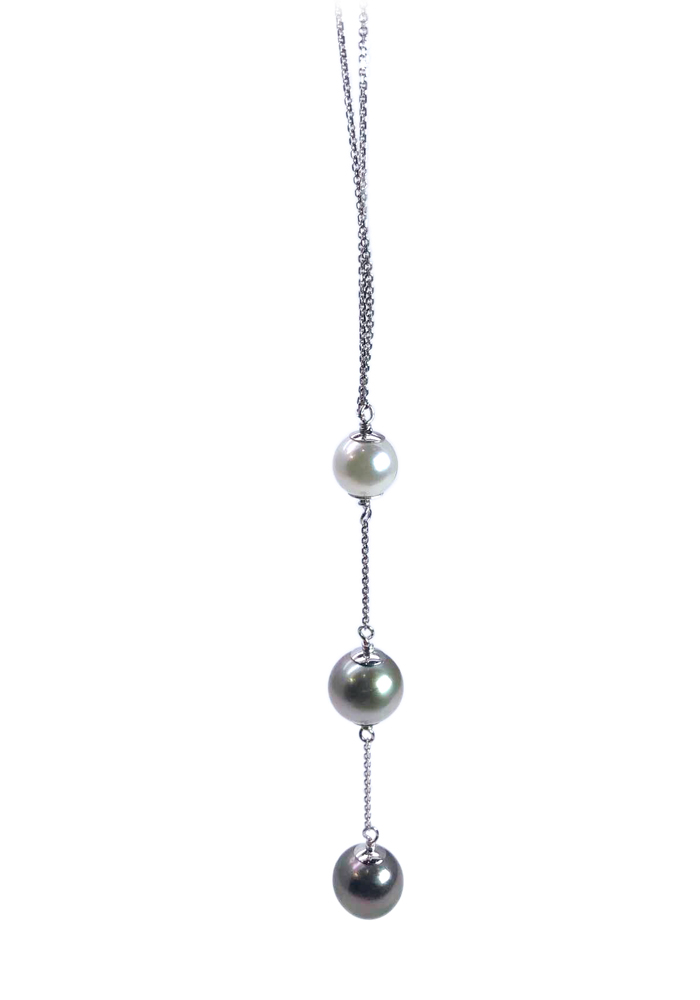 Sterling silver pendant with 3 spaced pearls of different colours hanging one above the other.